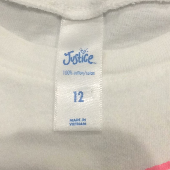 It’s a white t shirt with a puppy dog on the front - Picture 3 of 3